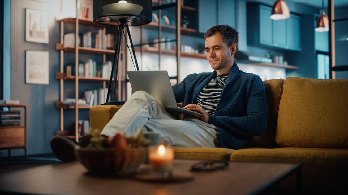 AdobeStock_425765993-man-on-couch-1125x633-sm