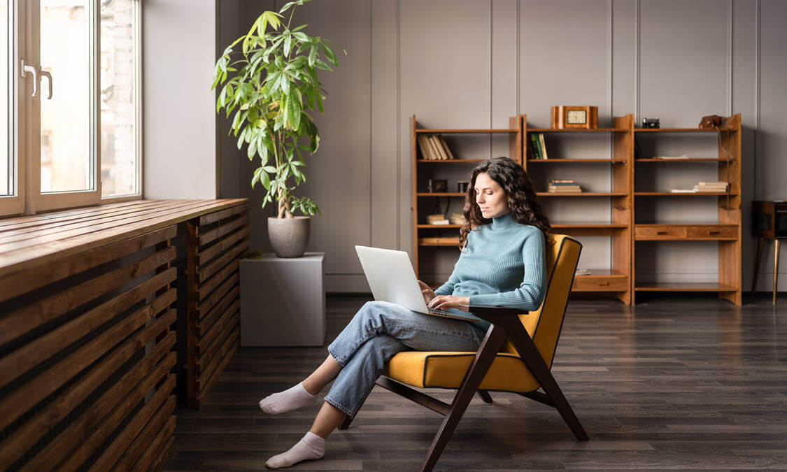 woman-in-chair and laptop-1125x675